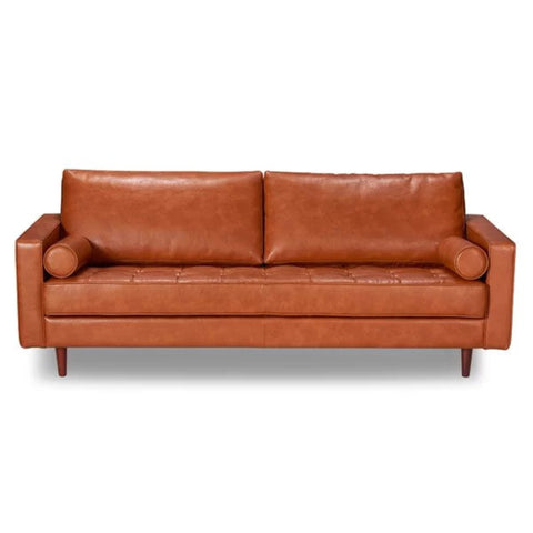 Caramel leather couch from Mypersnicketyhome.com