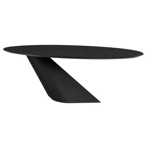 Black ceramic dining table from Mypersnicketyhome.com