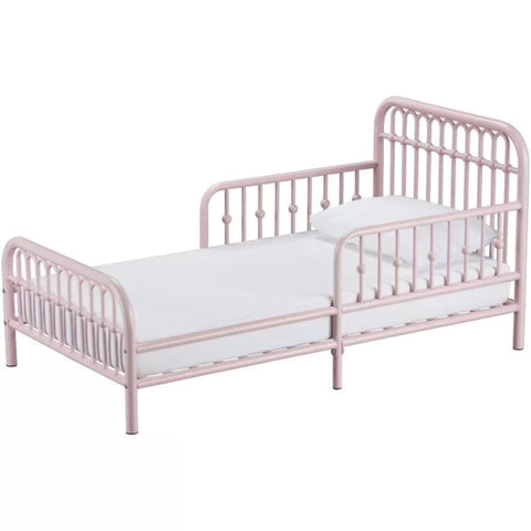 Pink metal toddler bed from Mypersnicketyhome.com