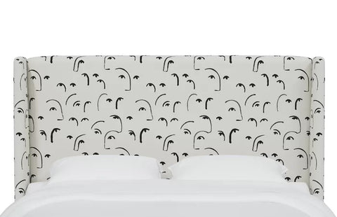 White upholstered headboard from Mypersnicketyhome.com