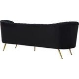 Black velvet couch from Mypersnicketyhome.com