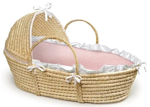 Pink wicker bassinet from Mypersnicketyhome.com