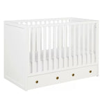 White wood crib with storage from Mypersnicketyhome.com