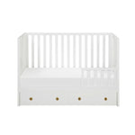 White wood crib with storage from Mypersnicketyhome.com